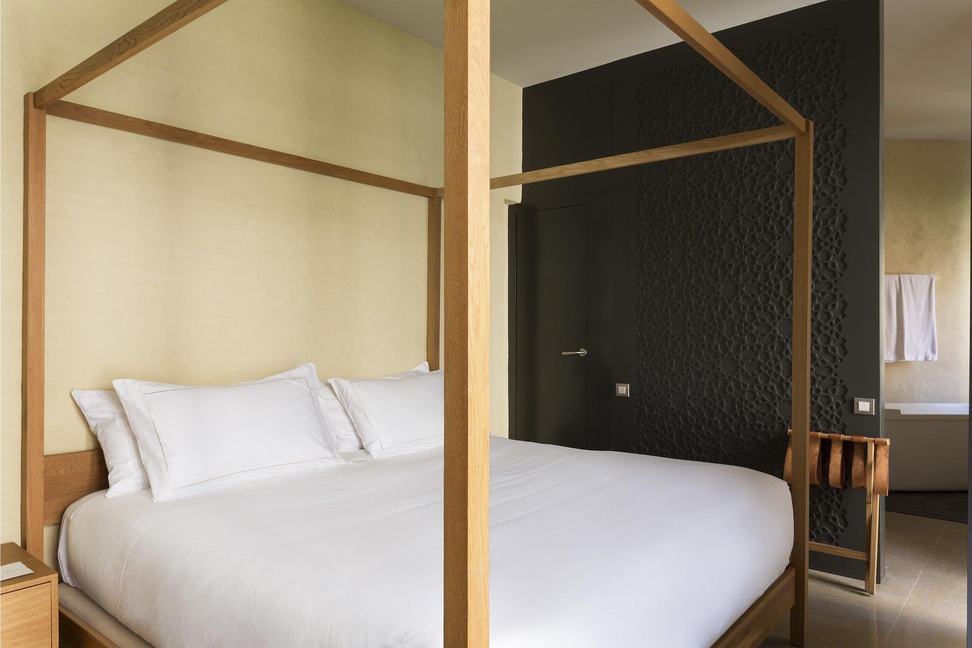 อีเอ็มอี คาเตดราล เมร์เซร์ Hotel เซบีญา ภายนอก รูปภาพ A room at the hotel