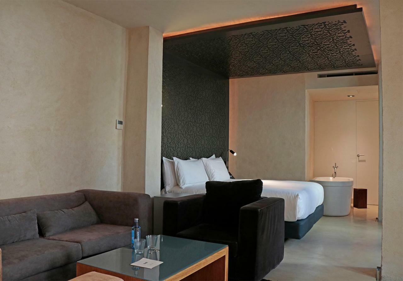 อีเอ็มอี คาเตดราล เมร์เซร์ Hotel เซบีญา ภายนอก รูปภาพ A suite at the hotel