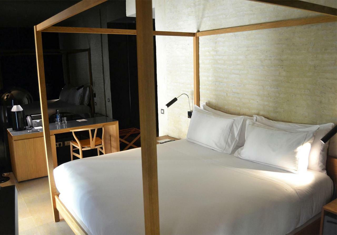 อีเอ็มอี คาเตดราล เมร์เซร์ Hotel เซบีญา ภายนอก รูปภาพ A room at the hotel